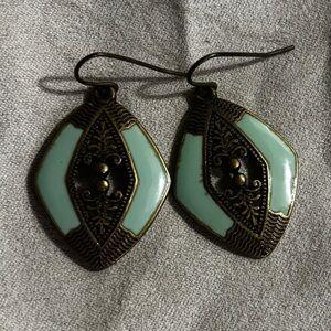 Vintage earrings brass base with a teal accent.
